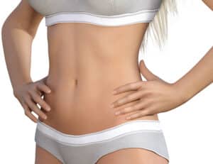 A woman showing her contoured stomach